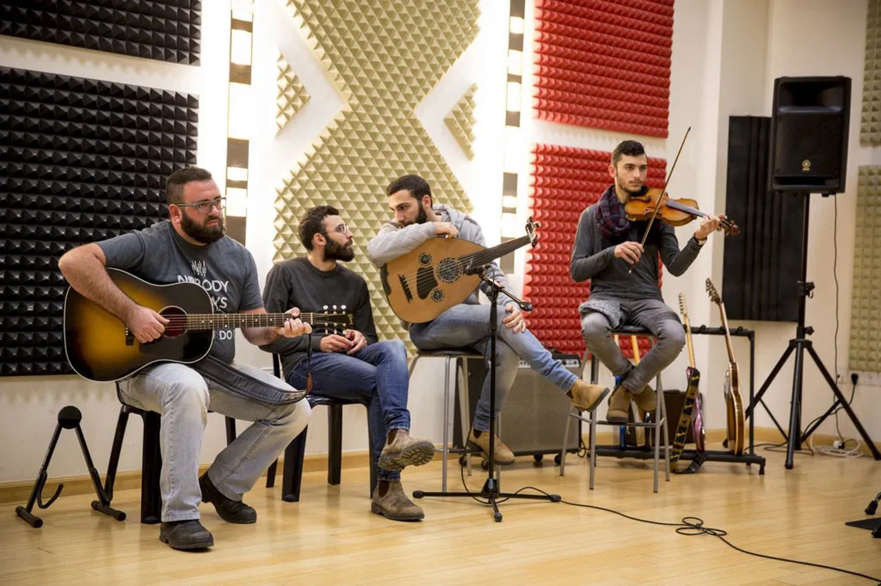 Maoz Israel playing music